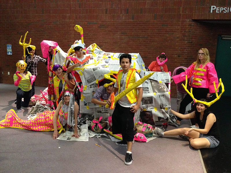 NCC Sculpture students create structures using newspaper and duct tape.