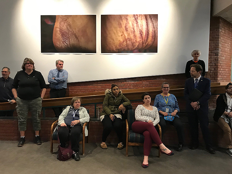 Students, staff and community mebers at the opening reception for the 2019 Art Faculty show
