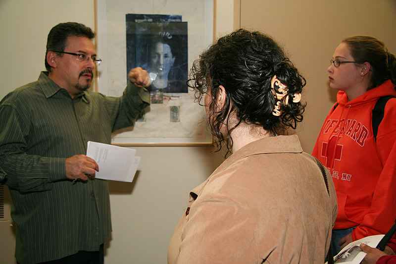 Curator Ben Ortiz speaks with NCC staff and students